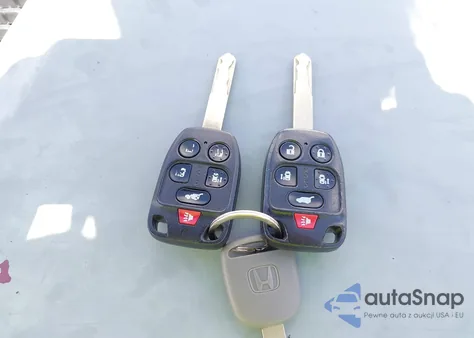 2012 Honda Odyssey Ex-L из США, поврежденный, VIN 5FNRL5H60CB051797